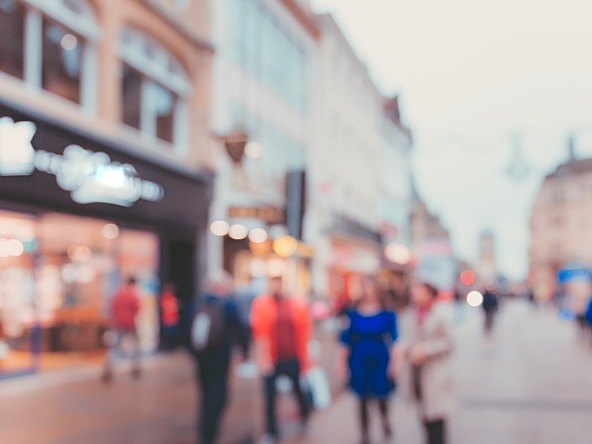 Blurred high street shoppers
